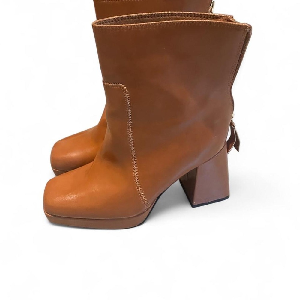 Tan leather ankle boots with a block heel western boho